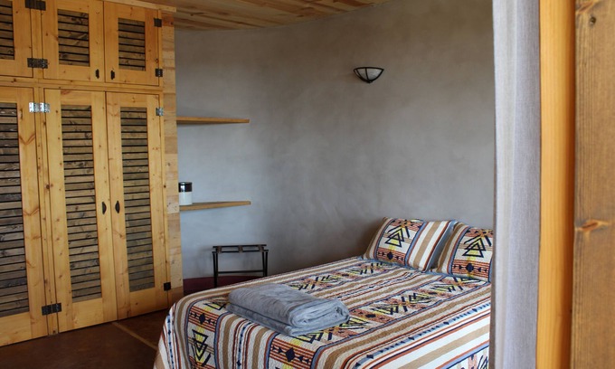 Petaca House | Pet Friendly Earthship in the biggest Off-The-Grid community in the US