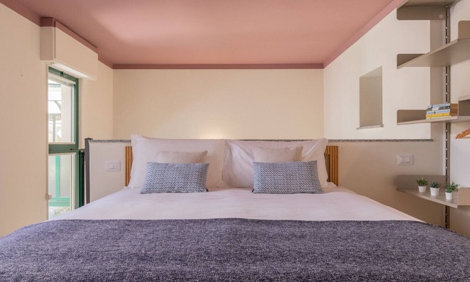 Cit Turin Apartment | Pink Loft by Wonderful Italy