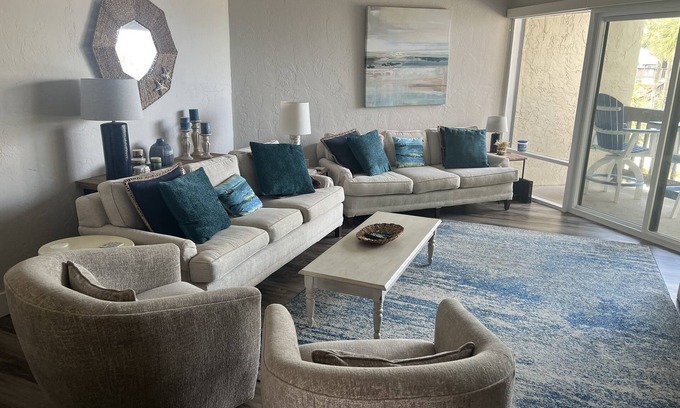 Butler Beach Condo | Pool and Ocean Views. Steps from the beach