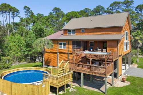 Pass Christian House | Pool Retreat Waterfront 6 Bedroom Boat Ramp Game Room Pass Christian Home