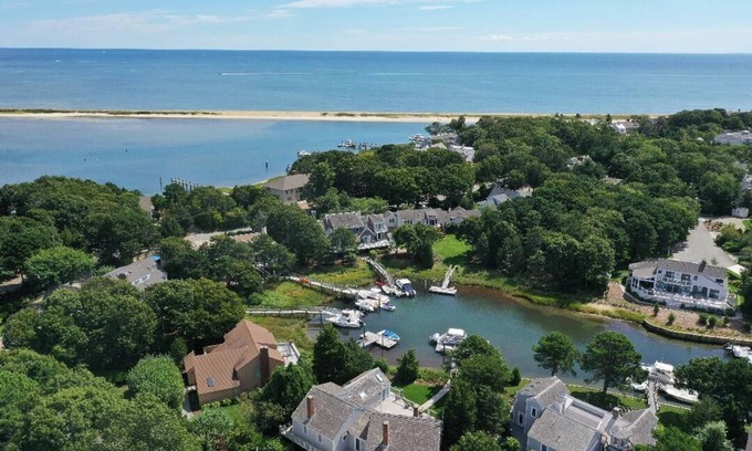 Popponesset Island House | Popponesset Isl Designer Expanded Ranch with Deepwater Dock "The Goldfish House"