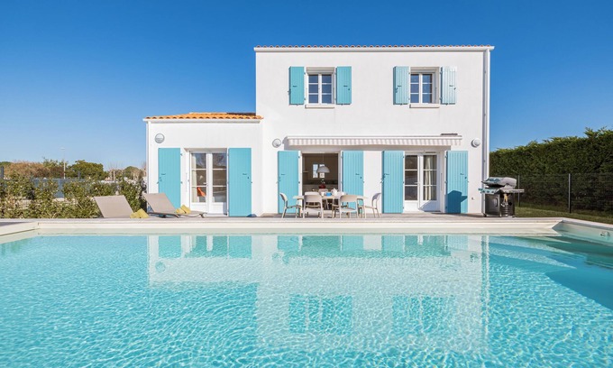 Le Grand-Village-Plage House | Pretty new house with fenced garden, swimming pool and air conditioning.