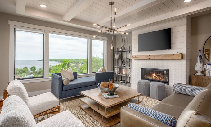Sister Bay Condo | PRIME LOCATION! Professionally designed amenities boasting a picturesque view