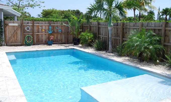 North Andrews Gardens House | Private 3/2 home, heated salt water pool, under 3 miles to beach