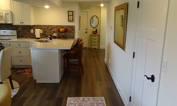 Loveland House | Private, beautiful one-bedroom basement apartment, with walkout and amenities!