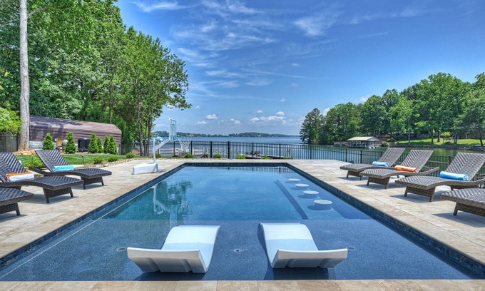 Denver House | Private Dock, Boat Ramp, Saltwater Pool & Waterfront Firepit | Bright Water Cove