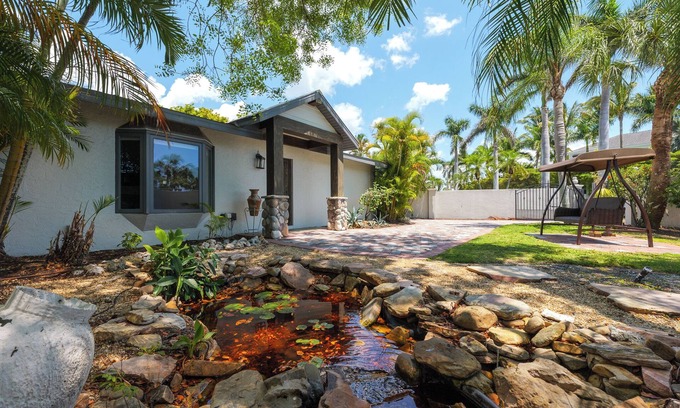 Ringling Estates House | 🏝Private Gated Home w/heated pool - a 1 minute walk to St Armands Circle🏖
