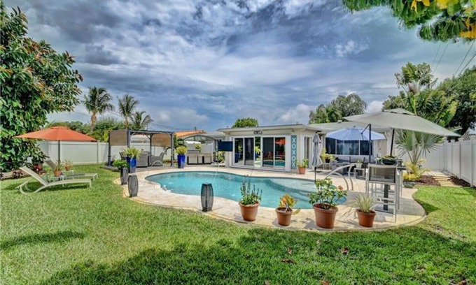 Deerfield Beach House | Private home with private heated pool and huge backyard . Five min to beach .