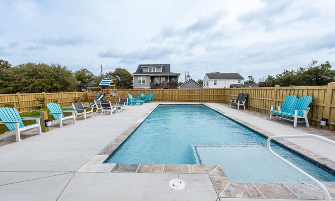 Kill Devil Hills Apartment | PRIVATE King Suite, POOL, GRILL,outdoor shower,coffee bar,mini fridge,microwave