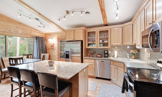 Manitowish Waters House | Private lakefront home with boat dock, fireplace, & generous yard