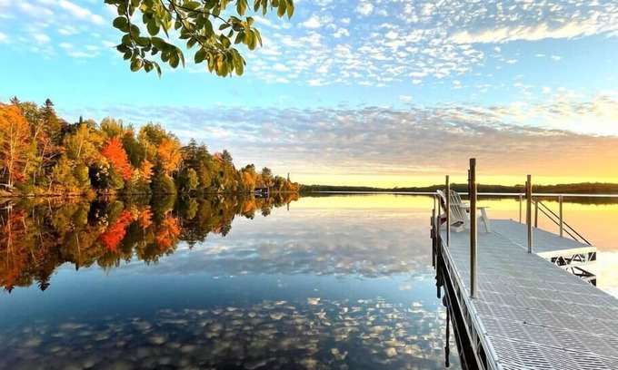 Presque Isle Cabin | Private Lakefront Stay with Beautiful Sunset Views, Kayaks, & Kid’s Arean