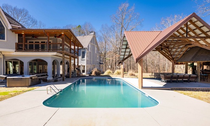 McDonald House | Private luxury home McDonald TN pool, hot tub, bar, volleyball, fitness, game rm