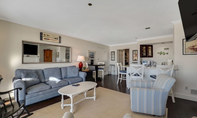 Boyne City Condo | Private Patio on Lake Charlevoix | Ground Floor Getaway with sunset views |
