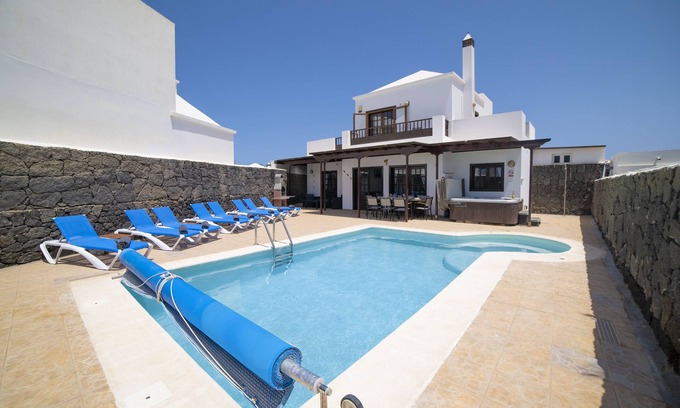 Playa Blanca Villa | Private pool and hot tub, mountain and sea views, pool table, children’s park.