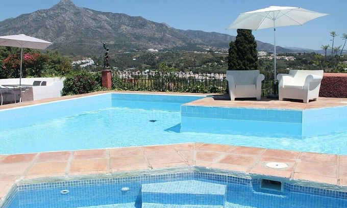 Marbella Apartment | Puerto Banus studio, sea views, pool and outdoor heated jacuzzi in the winter.