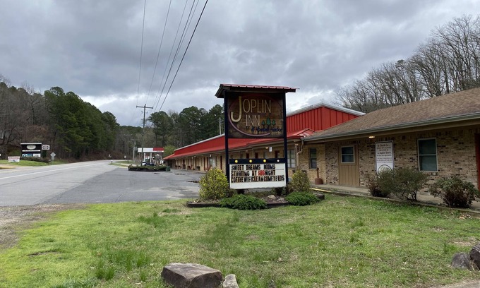 Mount Ida Apartment | Queen Guest Room located at the Joplin Inn at the entrance to Mountain Harbor, just 2 1/2 miles from Lake Ouachita. by RedAwning