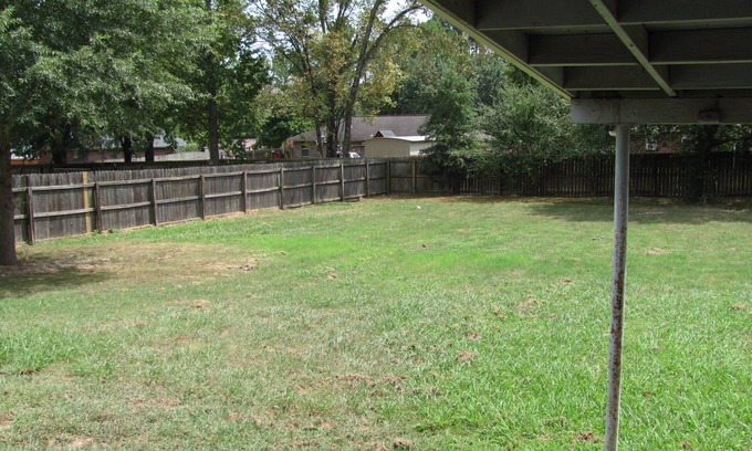 Atkins House | Quiet neighborhood with covered patio & plenty of space for family and friends!