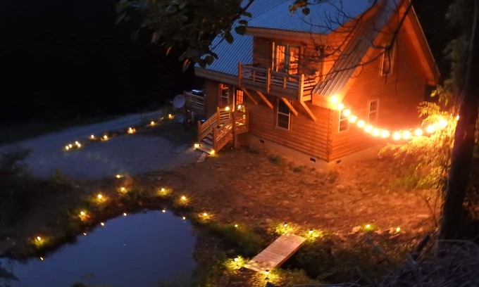 Bryson City Cabin | Real log cabin near Nantahala rafting! Hot tub, easy access, & game room.