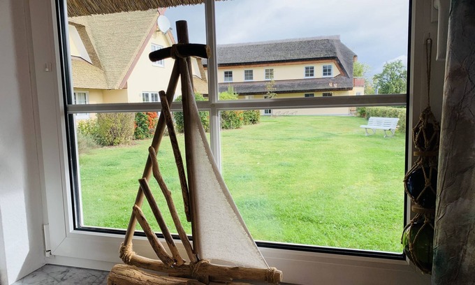 Middelhagen Apartment | Reethaus Boddenblick in Alt Reddevitz with parking lot, ground-level terrace, Wgh12