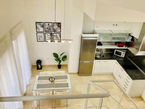 El Ejido Apartment | Refino 11
