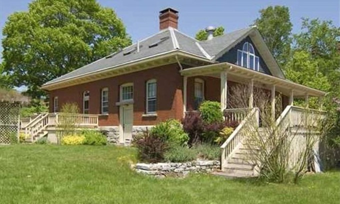 Portland House | Refurbished Brick, Waterfront Home on Cushing's Island.