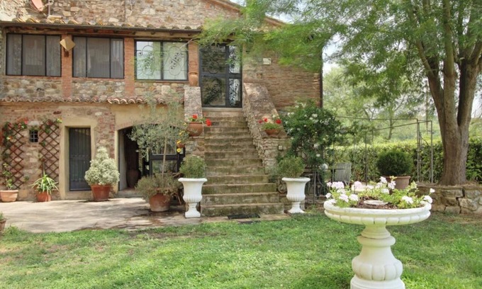 Castiglione della Pescaia Apartment | Reggia, in small medieval village characteristic apartment with fireplace