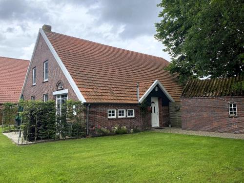 Strackholt Apartment | Reihenhäuser in Strackholt, cleaning included