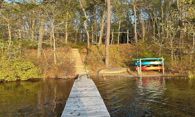 Harwich House | Relax in a tranquil log home on direct lake front property. The Hermitage awaits