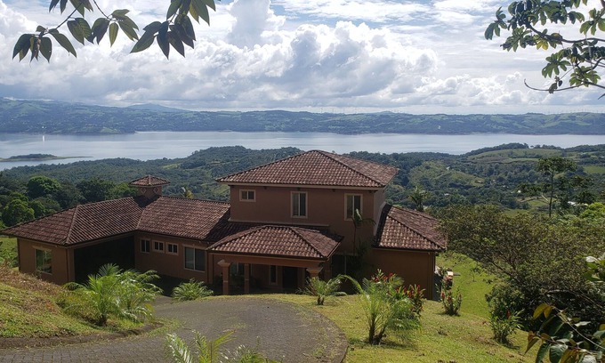 Arenal Villa | Relax in Jacuzzi with panoramic Views of Lake arenal after a day of adventure