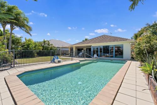 Banksia Beach House | Relaxation & Space in a Canal Home