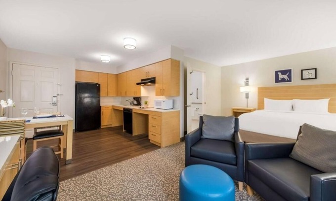 Arrowood Hotel | Relaxed and Roomy Suite with Fitness Center Near NASCAR Hall of Fame – 6 Miles