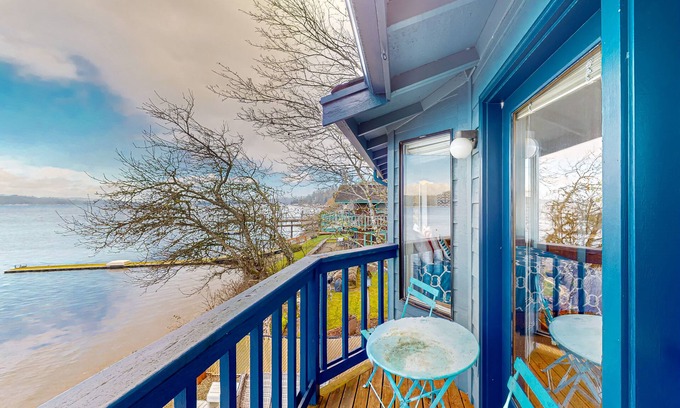 Belfair House | Relaxing bay front house with mountain views, lovely deck, wood-stove & firepit