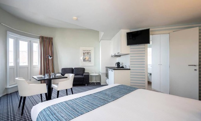 Ostend City Centre Hotel | Relaxing Room with Kitchenette | Quick Access to Local Attractions