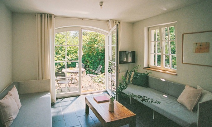 Werder Apartment | Remise ground floor - garden apartment with wood-burning stove and terrace