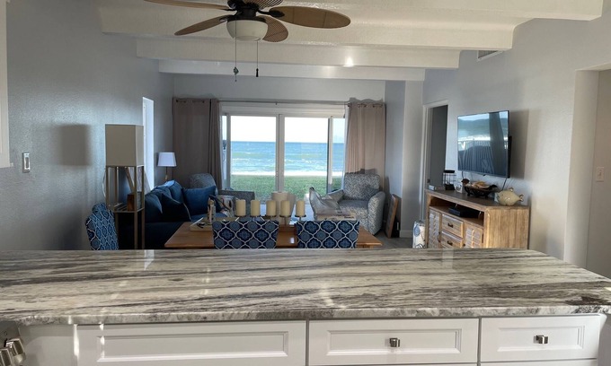 New Smyrna Beach Condo | RENOVATED 1st FLOOR DIRECT OCEANFRONT CONDO - Just steps from the beach and pool