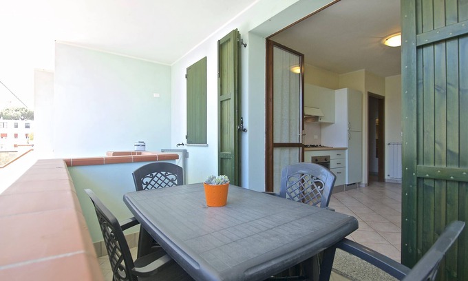 Lido degli Estensi Villa | Residence in a residence on the seafront, with terrace and barbecue, private garden with parking space.
