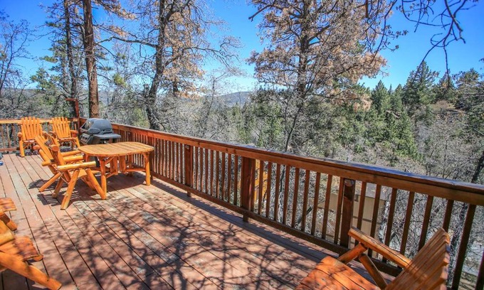 Upper Moonridge House | Rest N Relax Inn - Beautiful chalet-style cabin features dramatic forest and slope views!