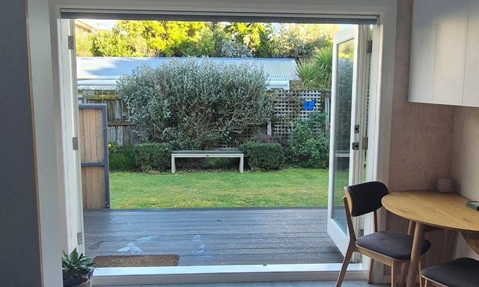 Paraparaumu Apartment | Retreat into Connection – A Couples Sanctuary by the Sea