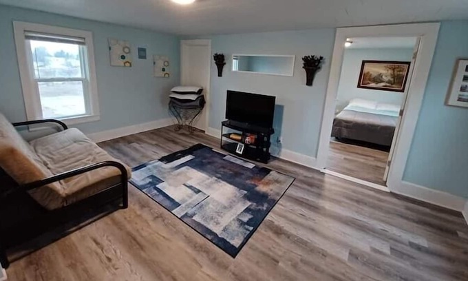 Two Rivers Apartment | Retro-Chic Riverfront Duplex on River St - Upper