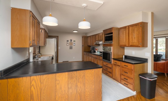 Sioux Falls House | Retro Ranch W/ Backyard Oasis