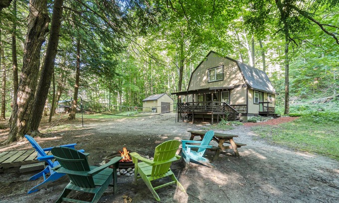 Frankfort House | Riverfront cabin on the Betsie with private dock, kayaks & bikes - 2 dogs OK