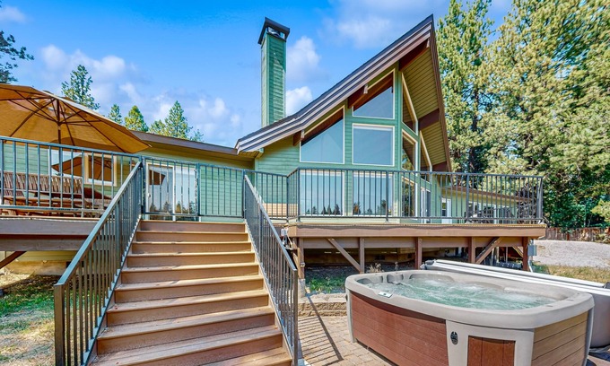 Three Rivers House | Riverfront Luxury Home with Hot Tub, AC, Deck and Grill