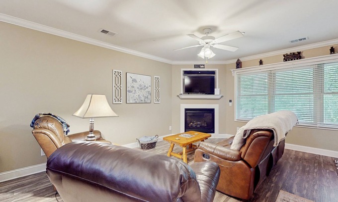 Helen Condo | Riverfront oasis with dual suites, 3 fireplaces, central AC, & walkable locale