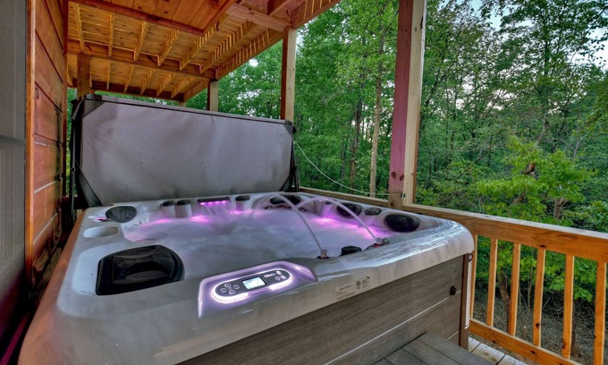 Mineral Bluff Cabin | Rohring Retreat - Bask in comfort on the deck and play games in the game room!