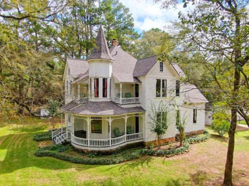 Waller Ski Chalet | Romantic 1901 Victorian Home on Seven Wooded Acres