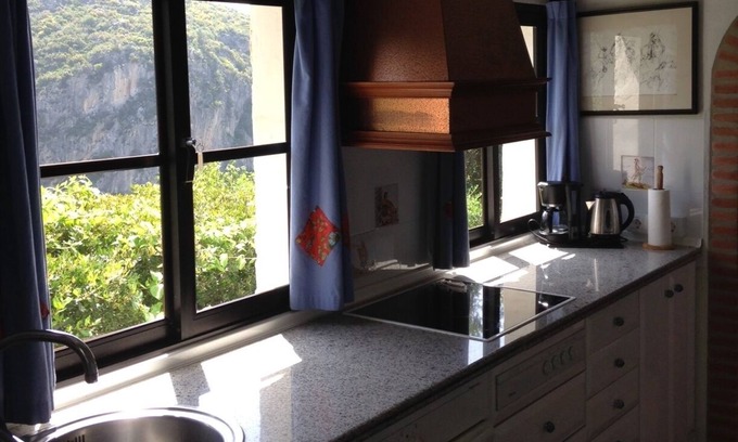 Casares House | Romantic cottages with lovely pool, winding pathways amid lush tropical gardens.