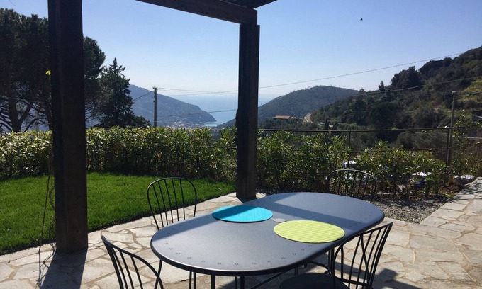Dosso House | Romantic nest seaview. Tipical stone house with garden close to Cinque terre