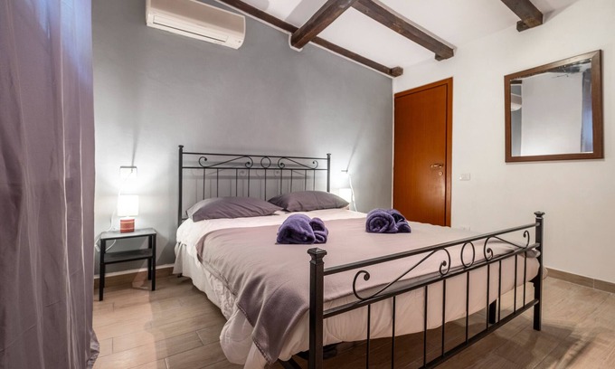 Porto Ercole Apartment | Room 'Scirocco' with Shared Terrace, Wi-Fi and Air Conditioning