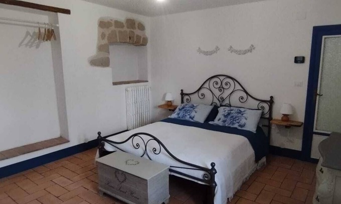 Orvieto House | Room with bathroom entrance and private garden nestled in the green hills of Umbria