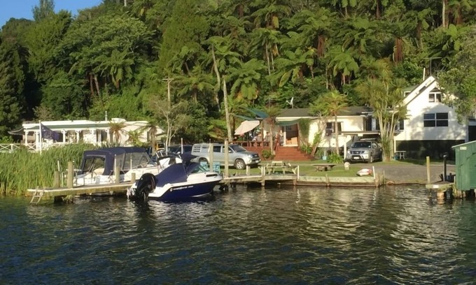 Okere Falls House | Rotoiti Lakeside Cottage,s Primo Lake Front,Flat section, Drive to the house,